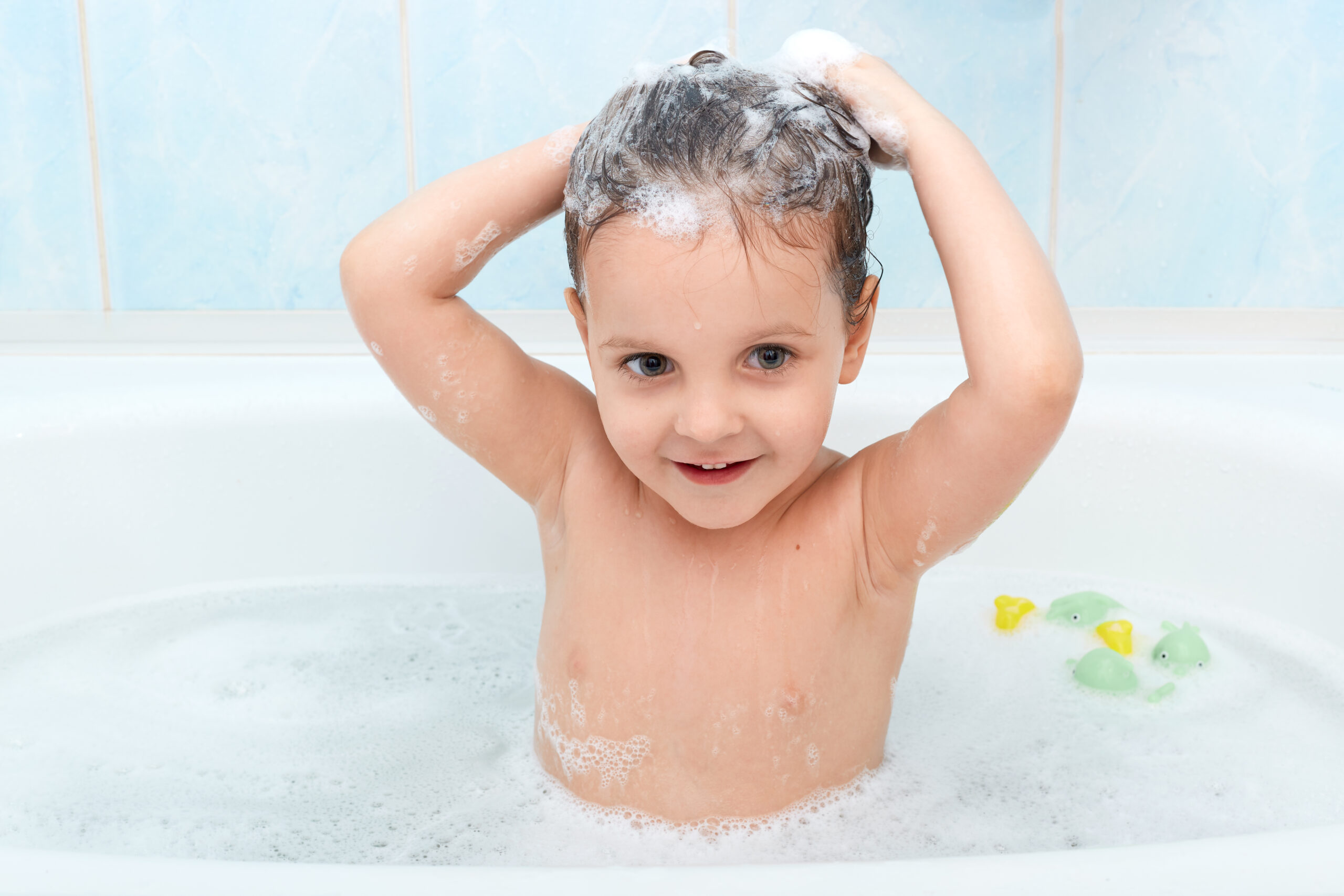 How to wash your baby's hair without getting water in their eyes.